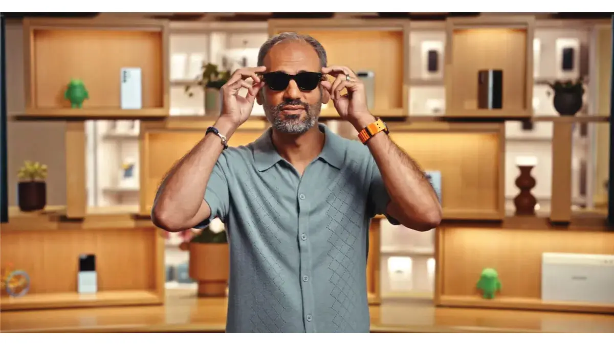 A person trying on a pair of Gentle Monster smart glasses during a Google product demonstration