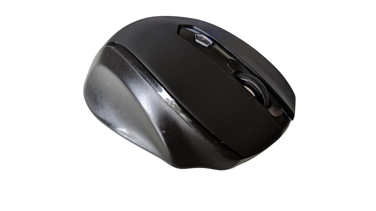 A plain black wireless mouse photographed from above against a white background, with no branding on it