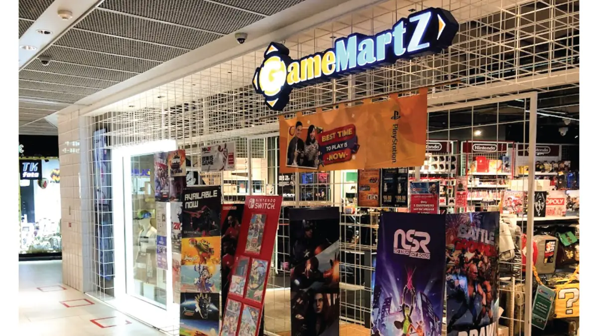 GameMartz store front in Singapore, its display walls stocked with consoles and boxed games