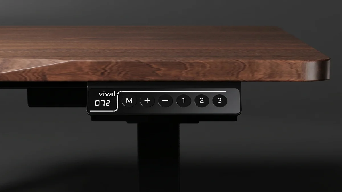A close view of the Vival controller under the walnut tabletop, its display reading 072 beside the M, plus, minus and 1, 2, 3 preset buttons.